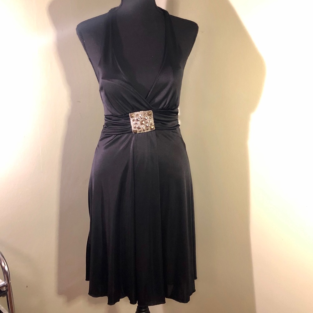 Black halter dress with silver broach detail